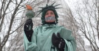 Protestor dressed as Lady Liberty on Capitol Square.