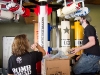 Amanda Nimmer and Bill Roberts unpack peanuts at AJ Bombers in Madison, Wis. on Oct. 4, 2011.