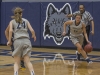 Madison College women's basketball player Rachel Slaney brings the ball up court.