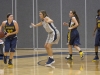 Madison College women's basketball player Rachel Slaney plays defense against Rochester.