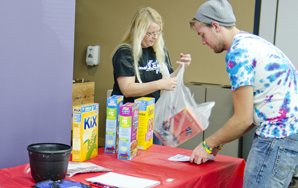 Student Ambassadors help with snack drive for child care center