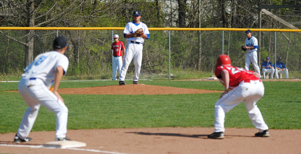 Madison+College+pitcher+Casey+Doucette+pitches+against+the+UW-Madison+Club+Team+on+April+17.+The+WolfPack+posted+a+7-1+victory.