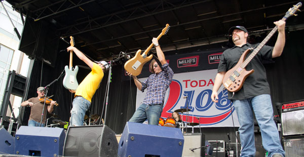 The Mighty Short Bus at Taste of Madison. Band members from left to right: Ben Stitgen, Frank Busch, Nic Adamany, Rob Junceau.