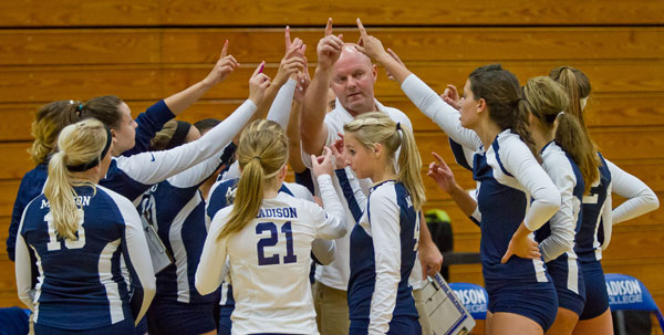 Coach Toby Parker gets the Madison College volleyball team ready for another match.