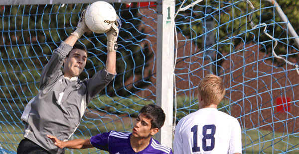 Madison College goalie Ian Murphy makes a save during his teams win over Harper College.