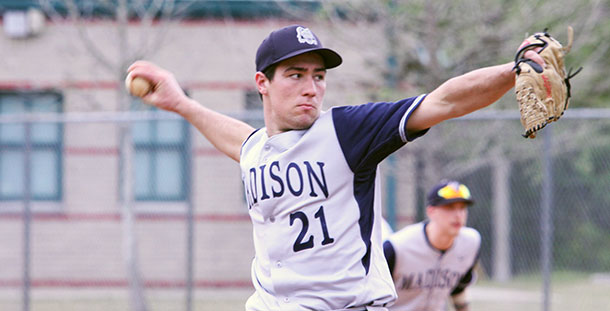 Madison College sophomore Jameson Sadowske (21) pitches during one of his team's games in Florida over spring break.
