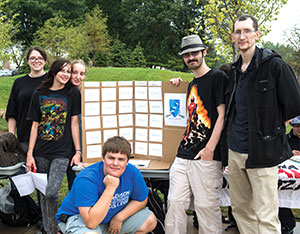 Members of the Madison College Nerds of the Round Table pose for a photo outside of the Truax campus.