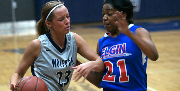 Madison College’s Brittany Kaltenberg (23) drives past Elgin’s Erica Haynes during a game at home on Dec. 3.