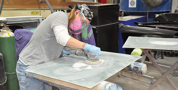 Madison College student Heather Serfoss works during an Auto Collision program course.