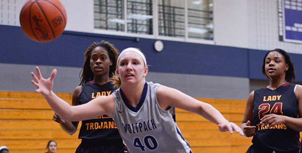 Madison College’s Meagan Mazur (40) tries to save a ball from going out of bounds against Triton College on Jan. 8.