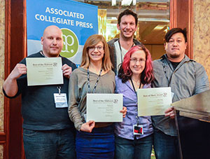 Clarion staff members, from left, Ryan Spoehr, Natalie Connors, Jacobe Ennis, Robin Gee and Ken Xiong show awards the group received at the Associated Collegiate Press Best of the Midwest Collegiate Journalism Conference on Feb. 9.