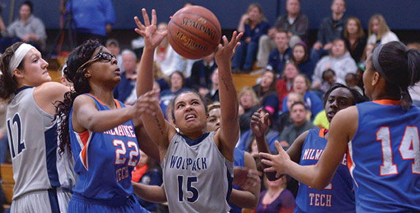 Madison College’s Gabrielle Hood (15) grabs a rebound on Feb. 8 against Milwaukee Technical College.