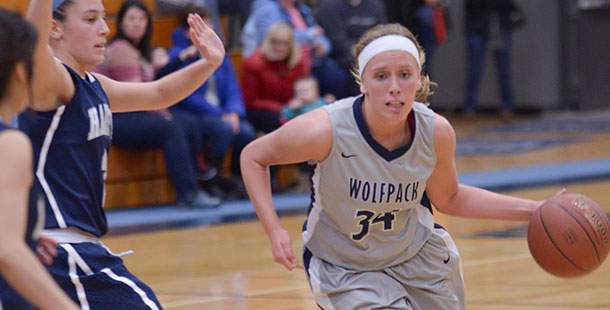 Madison College womens basketball player Lizzy Britt pushes the ball up court during a recent game.