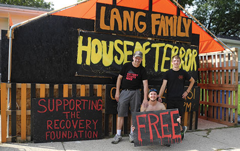 From left, Mark, Dustin and Brandon Lang create a yearly haunted house at their family home in Oregon, Wis.