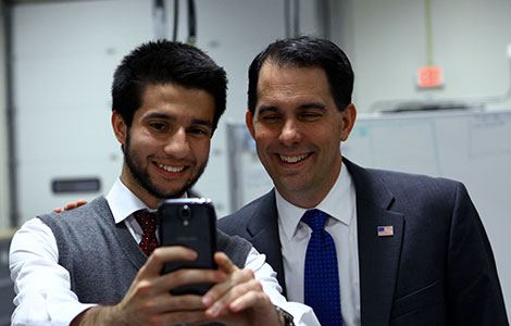 Student Senator A.J. Cifuentes takes a selfie with Gov. Walker