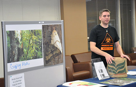 Phi Theta Kappa members presented their honors project on invasive species in the Truax Student Lounge.