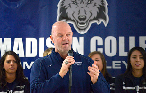 Madison College volleyball coach Toby Parker speaks in the Truax cafeteria on Nov. 25 during the ceremony celebrating the team’s second straight NJCAA Division III National Championship.