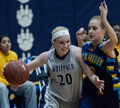 Madison College’s Taylor Nelson (20) drives past a Rock Valley College defender during her team’s 87-79 loss on Jan. 14.