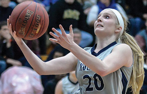 Taylor Nelson drives in for a basket during the Madison College womens basketball teams victory of Milwaukee Area Technical College on Feb. 14, 2015.