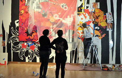 ChanSchatz’s assistants work on the exhibit, “22nd Century,” in the Madison Museum of Contemporary Art.