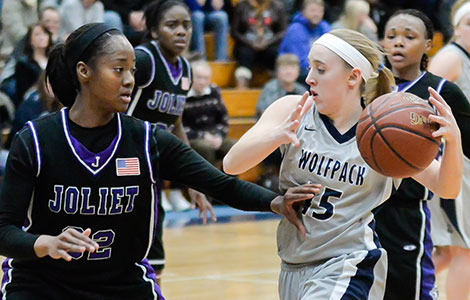 Madison College’s Kaitlyn Kast, right, drives past a Joliet defender during a win at home on Jan. 28.