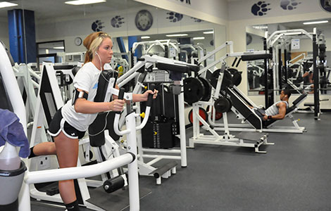 Students work out in the Madison College Fitness Center on the Truax campus on May 4. The center will be closed through August as it undergoes a second phase of renovations to make the space more safe, user-friendly and efficient.