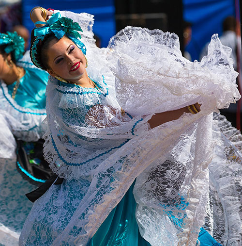 Cathryn Mellender of Ballet Folklorico Zihua performs a traditional Mexican dance in costumes made by Ballet Folklorico Zihua Director Dulce Mellender.