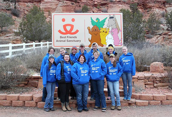 Madison College students on an alternative break trip to Best Friends Animal Sanctuary in southern Utah gather for a photograph.