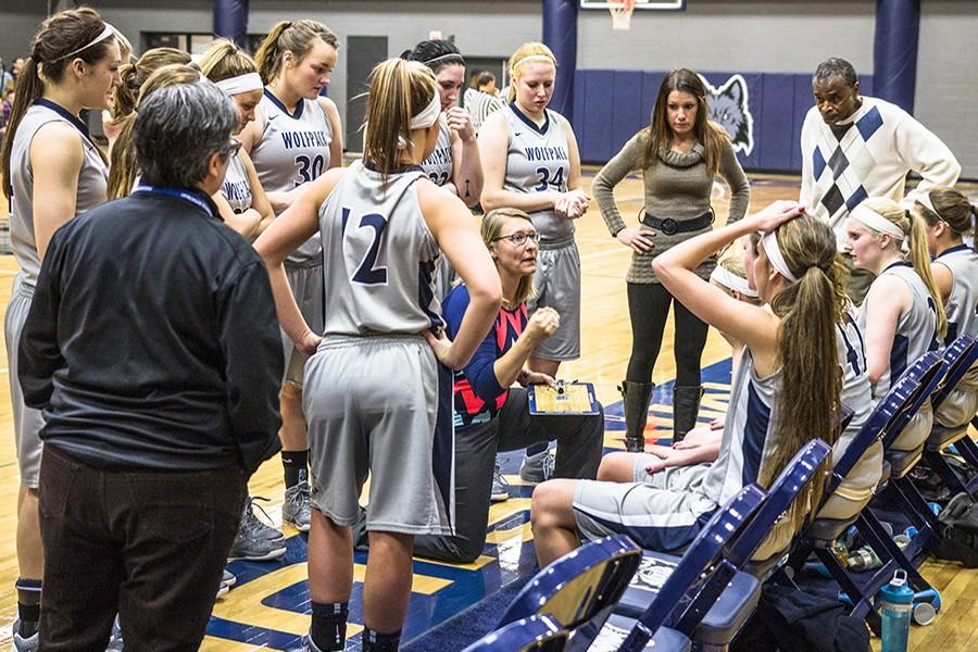 Madison College womens basketball coach Jessica Pelzel speaks to her team during a time out at a recent home game.