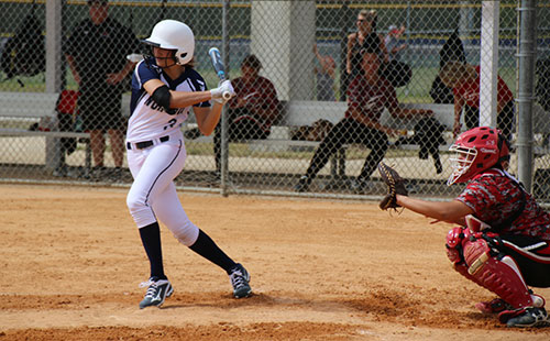 Madison College freshman softball player Brenna Seeber (3) prepares to slap the ball during a recent game on the team’s Florida trip over spring break. The WolfPack’s first home game of the season is scheduled for April 3.