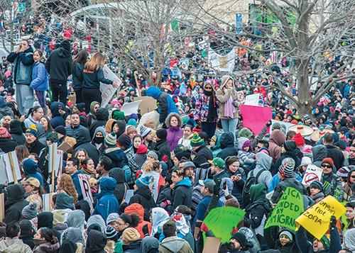 An estimated 20,000 people gathered outside the State Capitol in mid-February in protest of anti-imigration legislation.