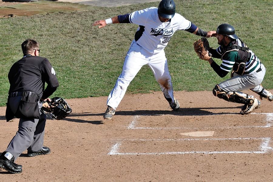 Madison College’s Carson Carmody attempts to dodge the tag on a play at the plate against Kishwaukee College at home on March 28. Madison College lost the game, 8-5.