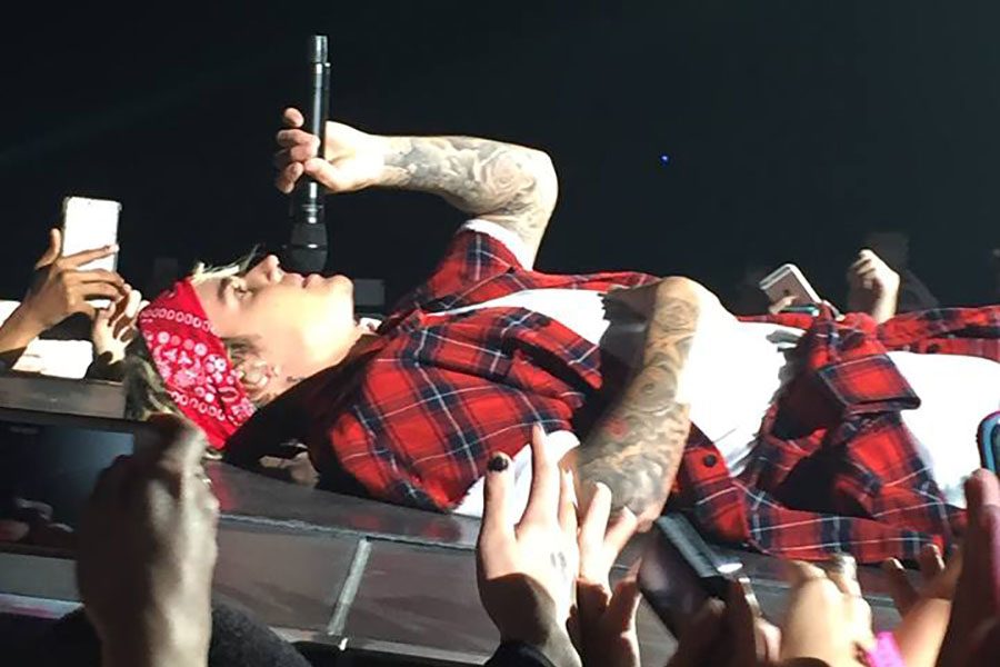 Justin Bieber lays down and sings in front of a group of screaming fans at Allstate Arena in Chicago on April 23. Bieber performed for two nights in the Windy City as part of his “Purpose Tour.” Bieber seemed to enjoy interacting with the audience throughout the entire show.