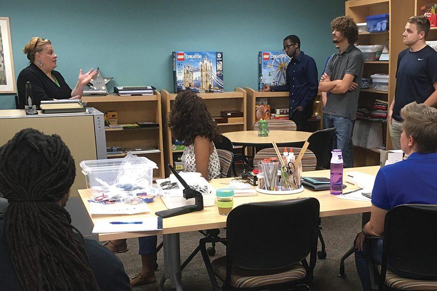 Madison College Library Director Julie Gores gives members of the Student Activities Board a tour of “The Creator Studio.”