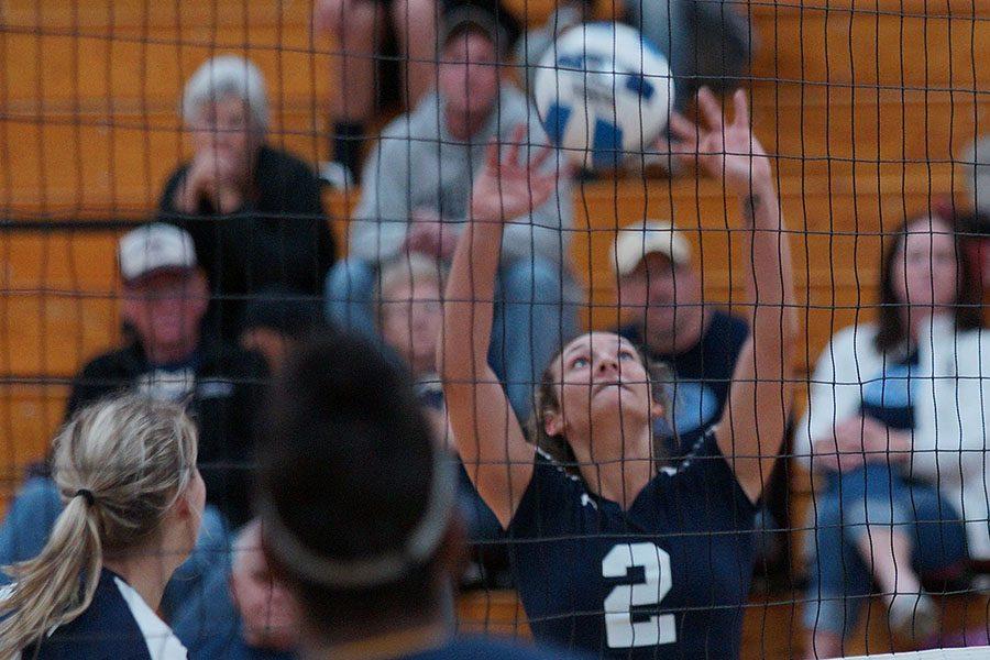 Madison College volleyball player Andrea Bauer (2) sets the ball for a teammate during a recent match at Redsten Gymnasium.