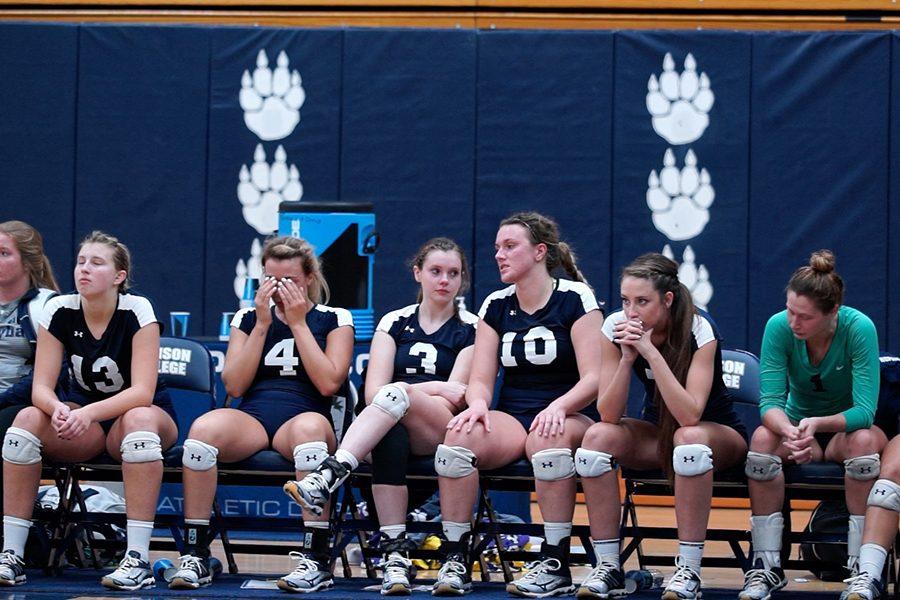 Members of the Madison College women’s volleyball team gather their emotions after a loss to top-ranked Harper College in the NJCAA Division III Championship played in Redsten Gymnasium on Oct. 29.