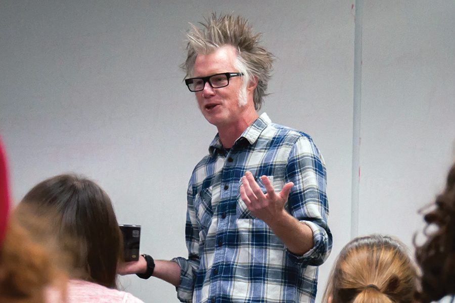 Poet Matt Hart reads a selection from one of his books during a visit to Madison College on Nov. 17. He was the guest of creative writing instructor Matt Guenette.