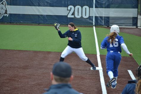 Madison College first baseman Brooke Heck tags the base for the out as a Kirkwood Community College player heads toward the base. Madison College opened its new Irwin A. & Robert D. Goodman Sports Complex on March 31 with a doubleheader against the No. 2 ranked team in NJCAA Division II.