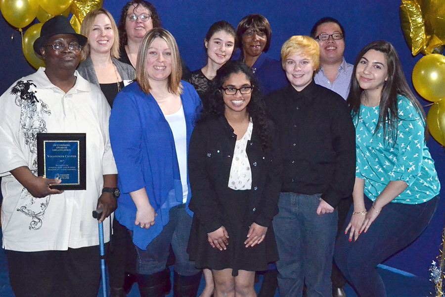 Members of the Madison College Volunteer Center gather for a photograph after receiving the award for Outstanding Student Organization.