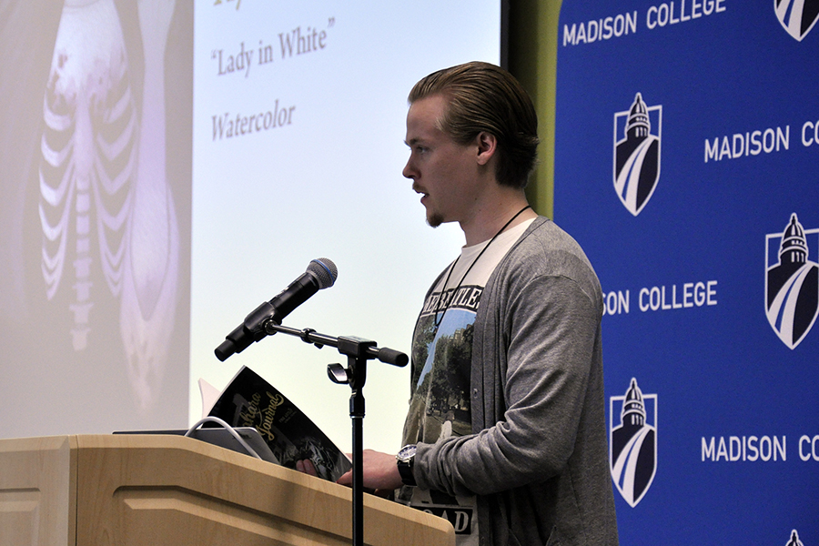 Madison College student Blake Nathaniel Tucker-Jones reads one of his poems during the Yahara Journals annual book release celebration held on Friday, April 28, at the Truax Campus.