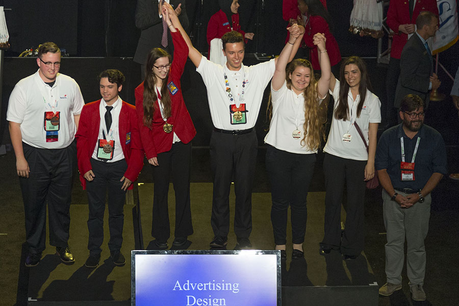 Allie Christensen, third from left, joins other winners in the “advertising design” competition on stage at the SkillsUSA national competition in Louisville, Ky., this summer.