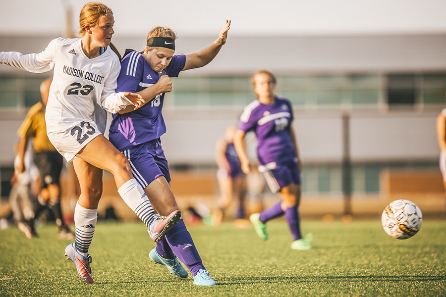 Madison College women’s soccer player Anna Cappaert (23) kicks the ball away from an opponent during a recent match.