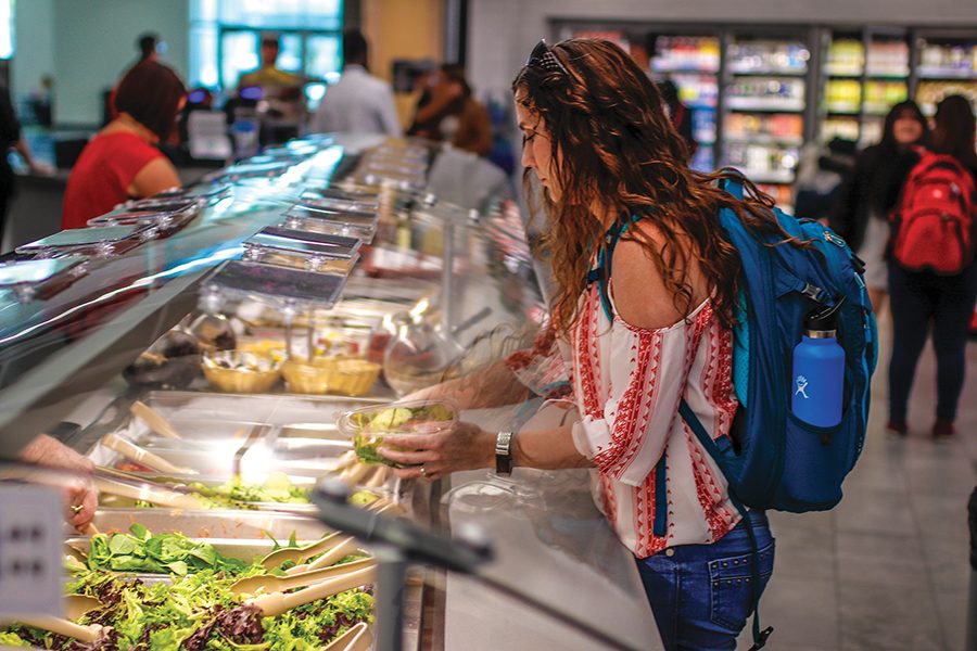 Students and staff grab lunch in the Truax cafeteria on Oct. 9. The Student Senate is working to raise awareness about student hunger, and recently completed a survey on the topic.
