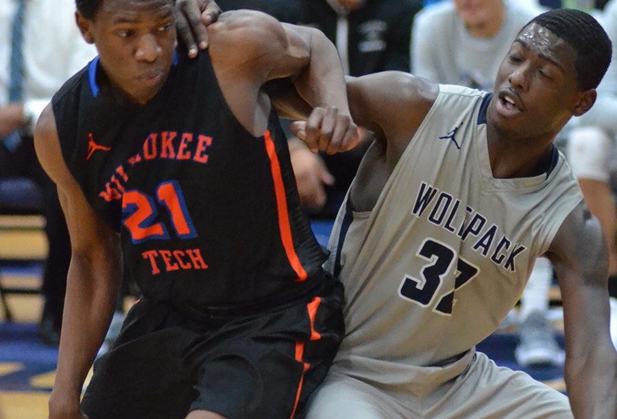 Madison College’s Deshawn Black, right, battles for position with an opponent.