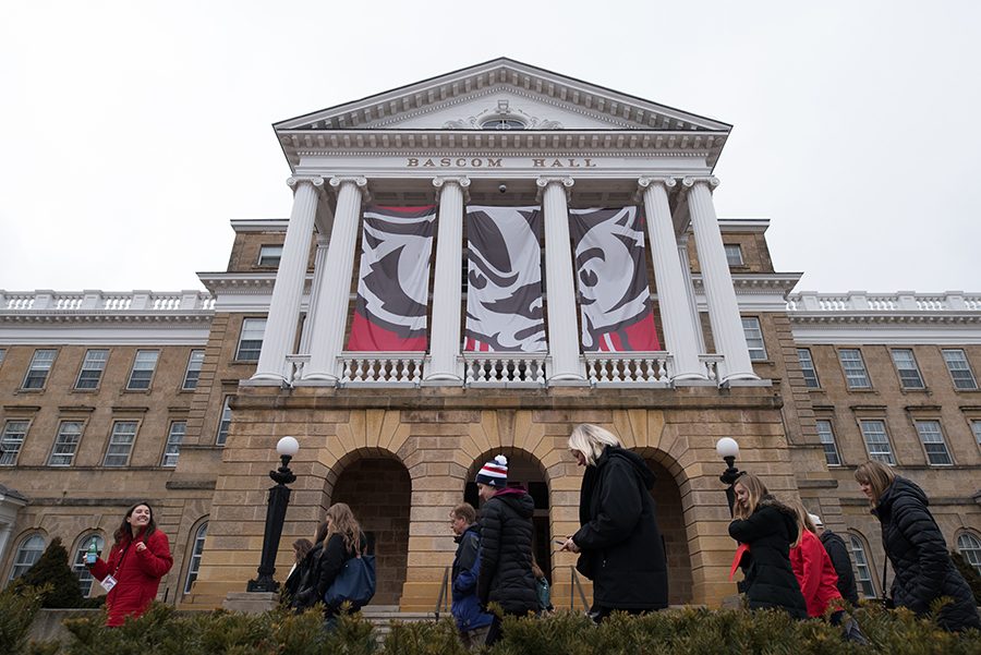 Students and visitors walk in front of Bascom Hill at the UW-Madison campus