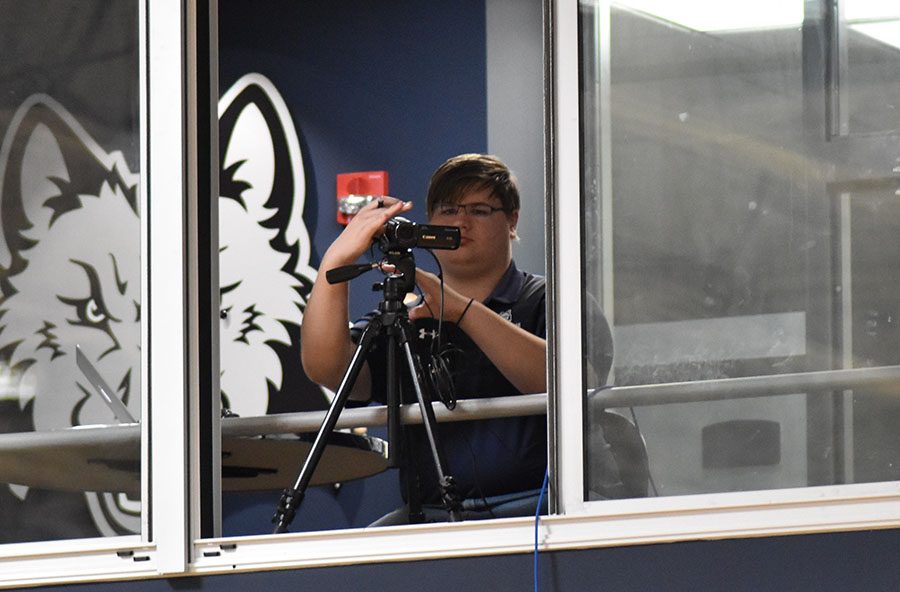 Student Matthew Webster is the man behind the scenes, broadcasting sporting events for the athletic department.