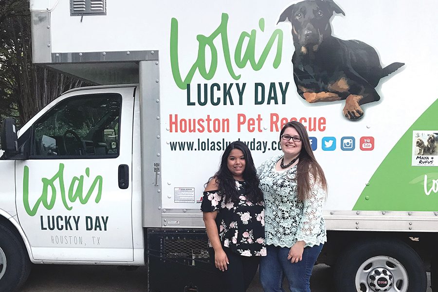 Taylor Andaverde, left, and former Madison College student, Samantha Hack, right, are just two of the volunteers helping Lola’s relocate homeless dogs from Texas.