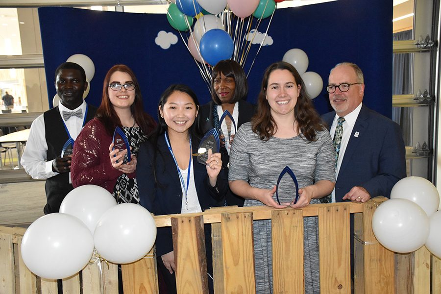 Karen Roberts Student Life Leadership award winners, from left, Ousman Darboe, Christina Marshalek, Kalia Vang, Katrina Willis and Jessica Pokrandt join Dr. Keith Cornille for a photo.