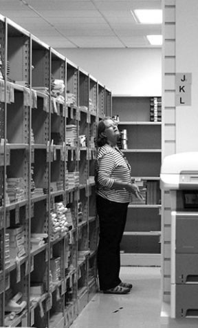 Shelves of books for sale at Madison College