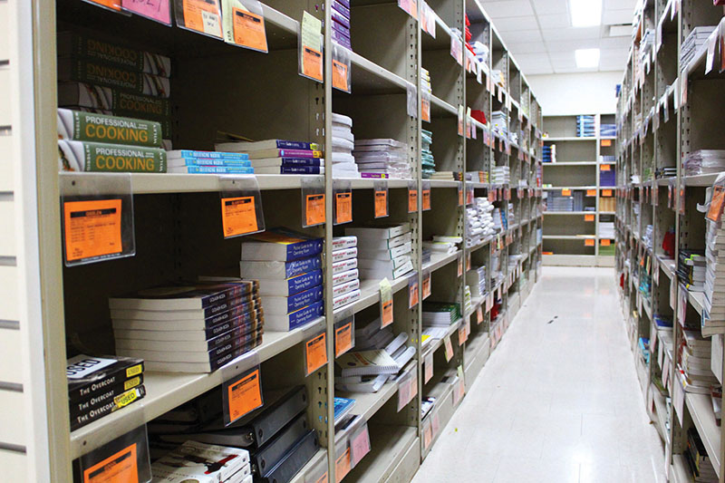 Textbooks rest on shelves at the Madison College bookstore until un-eager students line up to purchase them